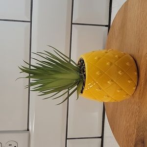 Faux succulent with pineapple planter